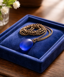 "Minimalist cobalt blue beach glass necklace, a handcrafted jewelry piece inspired by found coastal treasures."